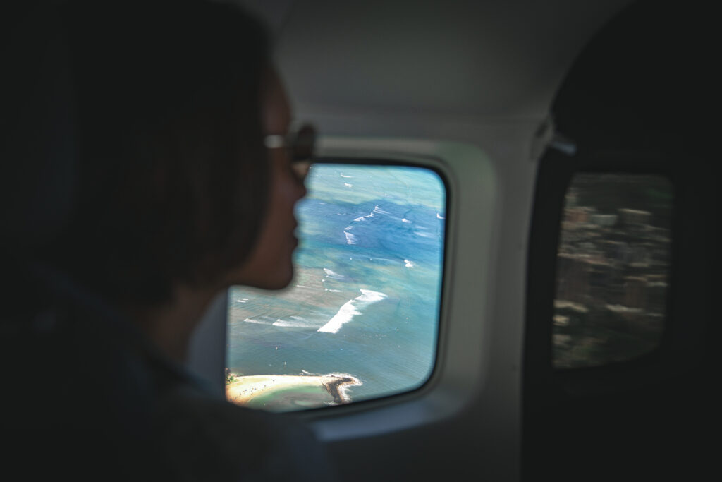 Looking out over the wing from a Mokulele cabin